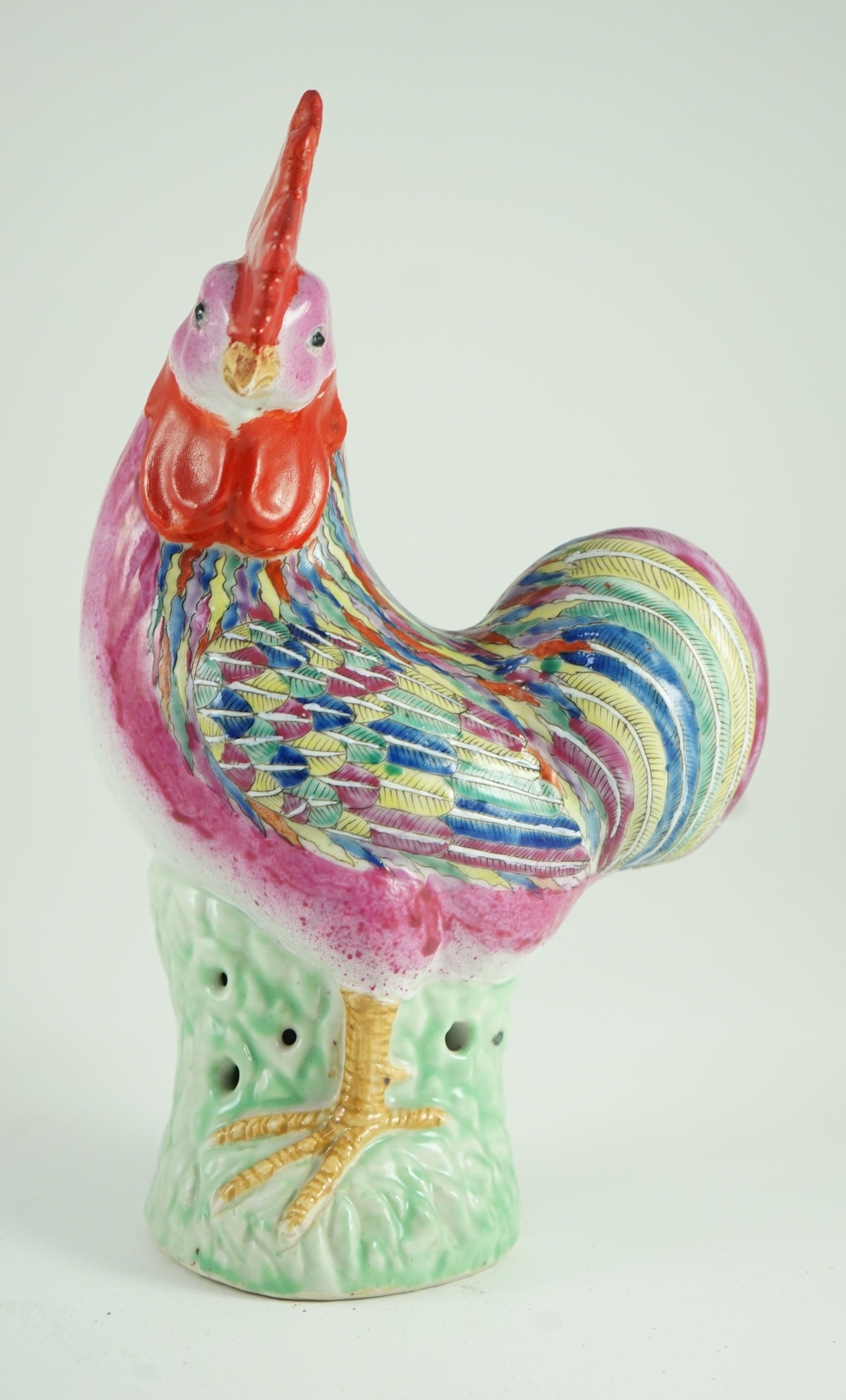 A Chinese enamelled porcelain model of a rooster, Jiaqing period, 29cm high, restoration